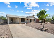 Charming single-story home with a long driveway and low-maintenance desert landscaping at 414 E Westchester Dr, Tempe, AZ 85283