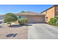Charming single-story home features a low-maintenance desert landscape and a two-car garage at 4199 E Citrine Rd, San Tan Valley, AZ 85143