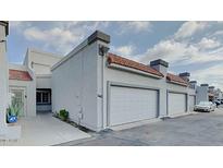 Charming townhome with two-car garage and well-maintained stucco exterior at 4776 W Eva St, Glendale, AZ 85302
