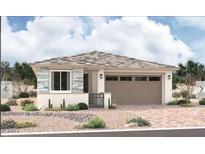 Charming single-story home with stone accents, desert landscaping, and a two-car garage at 15805 W Vogel Ave, Goodyear, AZ 85338