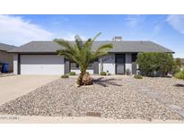 Charming single-story home featuring a xeriscaped yard and a well-maintained exterior at 6802 S 44Th Pl, Phoenix, AZ 85042