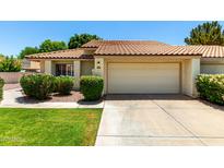 Charming single-level home featuring a tile roof, two-car garage, and well-maintained landscaping at 7324 S Bonarden Ln, Tempe, AZ 85283