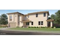 Beautiful new construction two-story home with a well-manicured lawn and neutral color palette at 10120 E Ulysses Ave, Mesa, AZ 85212