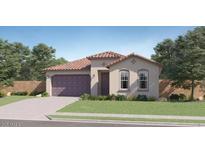 Charming single-story home with a well-manicured lawn and a two-car garage at 16743 W Charlotte Dr, Surprise, AZ 85387