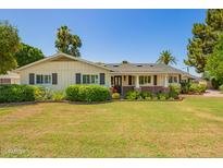 Charming single story home with lovely landscaping and brick accents at 5613 E Calle Del Paisano --, Phoenix, AZ 85018