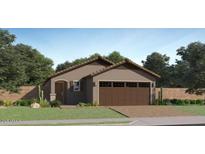 Charming single-story home with a two-car garage, desert landscaping, and neutral color palette at 9552 W Verde Ln, Phoenix, AZ 85037