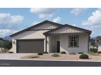 Charming single-story home featuring a two-car garage and low-maintenance landscaping at 24105 W Bowker St, Buckeye, AZ 85326