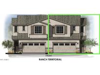 Charming two-story home showcasing a double garage, neutral color palette, and well-manicured landscaping at 2339 E University Dr # 19, Mesa, AZ 85213
