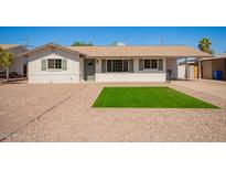 Charming single-story home with tidy desert landscaping and light colored exterior paint at 3209 N 20Th Pl, Phoenix, AZ 85016
