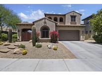 Stunning desert home with two-car garage, tile roof, landscaped front yard and private courtyard at 3770 E Ringtail Way, Phoenix, AZ 85050