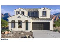 Charming two-story home features a neutral palette, desert landscaping, and a two-car garage at 7339 W Buckhorn Trl, Peoria, AZ 85383