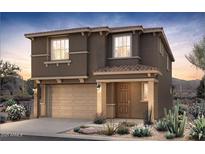 Charming two-story home with a two-car garage and desert landscaping at 17619 W San Juan Ave, Litchfield Park, AZ 85340