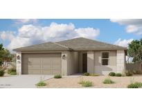 Inviting single-story home featuring a two-car garage, neutral stucco, and a well-maintained desert landscape at 5528 W Piedmont Rd, Laveen, AZ 85339