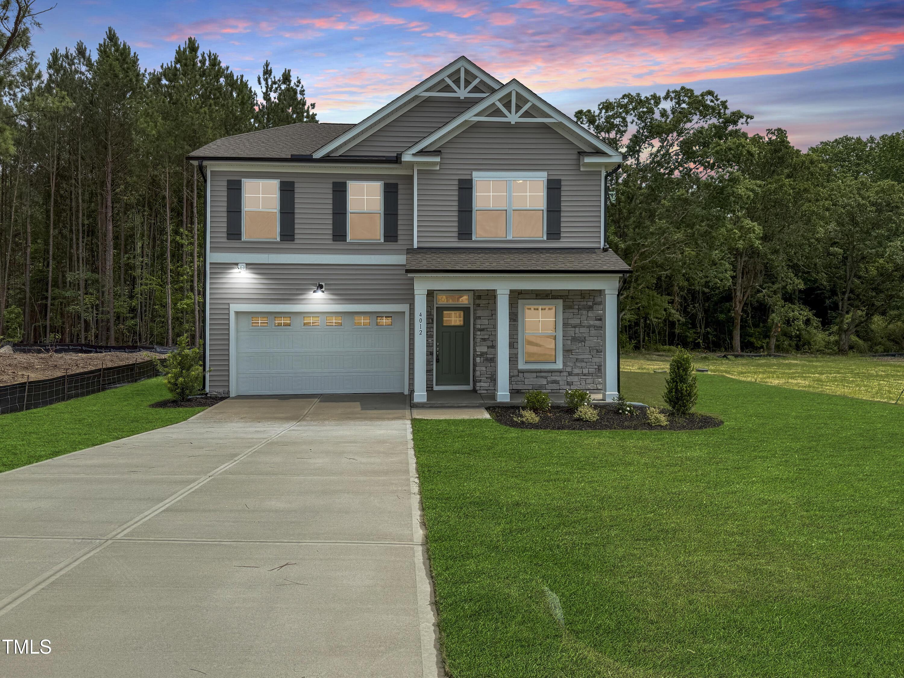 Photo one of 4012 Kingcraig Ln Zebulon NC 27597 | MLS 10086296