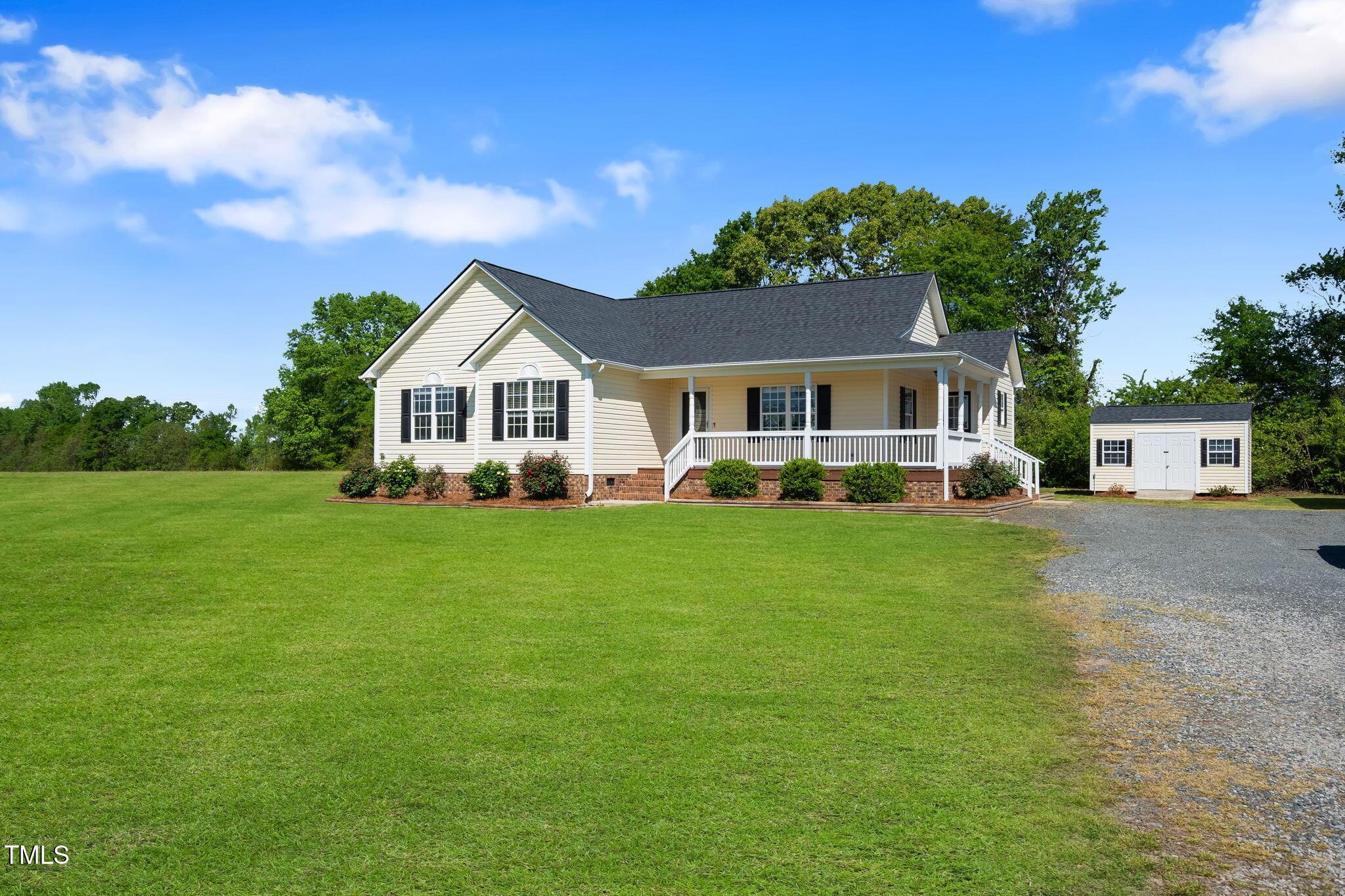 Photo one of 175 Bill Avery Rd Coats NC 27521 | MLS 10090267