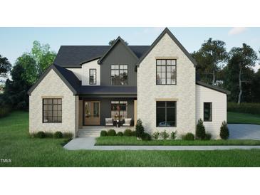Charming two-story home with a brick facade and modern black frame windows at 3612 Bailey Meadows Drive Dr, Wake Forest, NC 27587