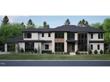 Striking modern home featuring stone and cement exterior with black framed windows at 4908 Foxridge Dr, Raleigh, NC 27614