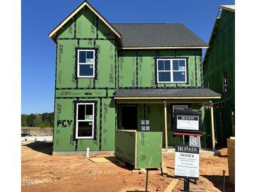 New construction home featuring ZIP System sheathing and a modern roof design at 2412 Adrift Road, Fuquay Varina, NC 27526