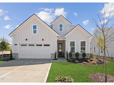 Charming single-Gathering home with a well-manicured lawn and a two-car garage, perfect for suburban living at 624 Gainer Dr # 17, Raleigh, NC 27610