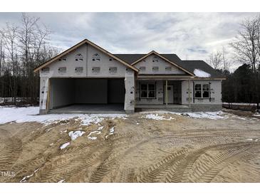 New construction home with a two-car garage and covered front porch at 702 Tuscany Cir, Princeton, NC 27569