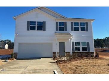 Two-story house with attached garage and large windows at 30 Calabria Ct, Franklinton, NC 27525