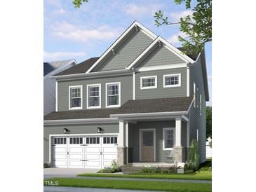 Charming two-story home with a welcoming front porch and a two-car garage at 252 Beacon Dr, Pittsboro, NC 27312