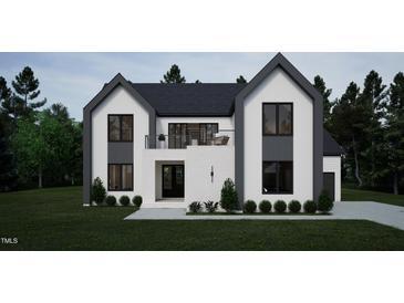 Modern two-story home with black trimmed windows, white brick and siding, a balcony, and dark gray roof at 60 Chestnut Oak Dr, Youngsville, NC 27596