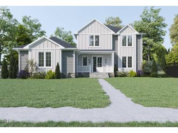 Two-story house with gray and white siding, landscaping, and walkway at 183 Lookout Rdg, Pittsboro, NC 27312