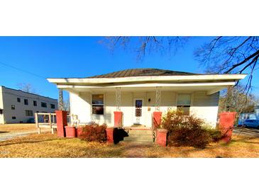 Charming house with a front porch and well-maintained yard at 1124 S Church St, Rocky Mount, NC 27803