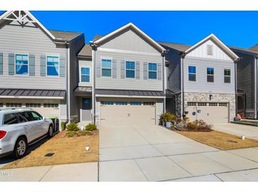 Modern 3-unit townhome development with 2-car garages at 2029 Maggie Valley Dr, Apex, NC 27502