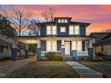 Two-story Craftsman home with gray siding, white trim, and a front porch at 835 Sunset Ave, Rocky Mount, NC 27804