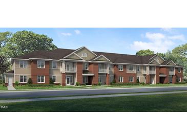 Brick building with multiple units and balconies at 614 Weather Ridge Ln # 26, Cary, NC 27513