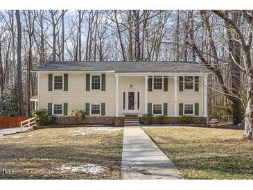 Two-story house with a covered porch and a landscaped yard at 1102 Willow Dr, Chapel Hill, NC 27517