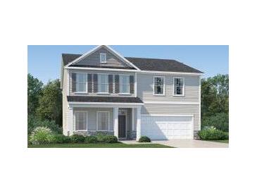 Two story house with gray siding, stone accents, and a two car garage at 605 Morning Light Dr, Angier, NC 27501