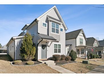 Two-story house with gray siding, landscaping, and walkway at 107 York Dr, Oxford, NC 27565