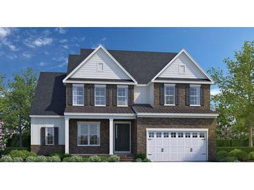 Two-story brick home with white accents and a three-car garage at 3197 Armeria Dr, Apex, NC 27502