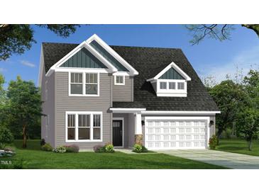 Two-story house with gray siding, white trim, and a two-car garage at 802 Brookfield Dr, Gibsonville, NC 27249
