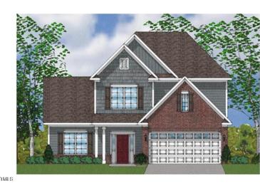 Two-story home with gray siding, brick accents, and a two-car garage at 268 North Maple Walk Dr # 232, Garner, NC 27529