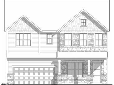 Two-story home with a gable roof, attached garage, and front porch at 304 Murray Grey Ln, Wake Forest, NC 27587