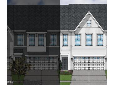 Two-story townhome with attached garage and front landscaping at 194 Nimble Way # 217, Clayton, NC 27520