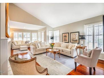 Spacious living room with hardwood floors and ample natural light at 312 Kirkwood Dr, Chapel Hill, NC 27514