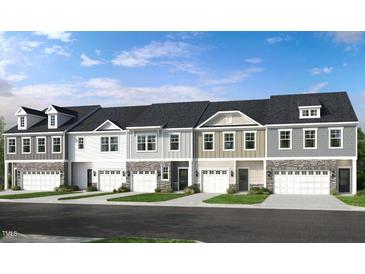 Five-unit townhome building with two-car garages and stone accents at 269 Sweetbay Tree Dr, Wendell, NC 27591