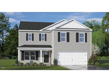 Two-story house with gray siding, white trim, and a two-car garage at 6461 Alfalfa Ln, Wake Forest, NC 27587