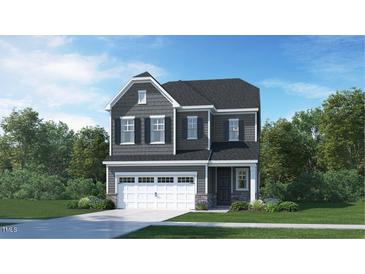 Two-story Craftsman home with gray siding, white trim, and a two-car garage at 613 Emerald Bay Cir, Raleigh, NC 27610