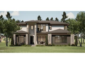 Two-story modern home with a neutral color palette and a large front yard at 403 Carolyn Ct, Cary, NC 27511