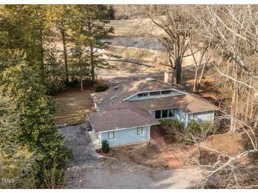 Aerial view of house and surrounding golf course at 232 Lakeview Dr, Sanford, NC 27332