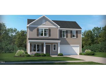 Two-story house with gray siding, white trim, and a two-car garage at 149 Kidderminster Ct, Zebulon, NC 27597