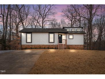 Newly renovated single story home with a charming front yard at 1608 Overlook Ct, Sanford, NC 27332