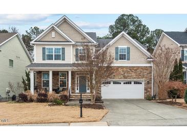 Two-story house with stone accents and a landscaped yard at 200 Callandale Ln, Durham, NC 27703