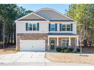 Two-story house with stone accents and a two-car garage at 98 Panmure, Rocky Mount, NC 27804